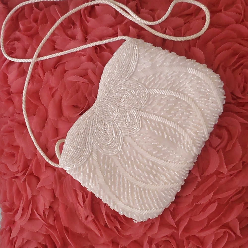 Beaded little white bag perfect for a bride.
